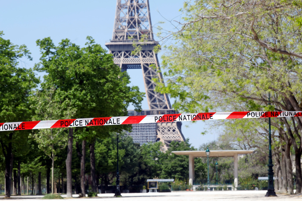 Police lines are seen to prevent people from walking near the Eiffel Tower in Paris as a lockdown is imposed to slow the rate of the coronavirus disease (Covid-19) in France April 20, 2020. u00e2u20acu201d Reuters pic