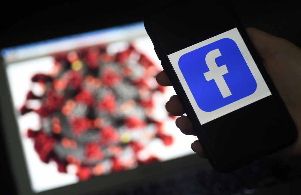 In this file photo the Facebook logo is displayed on a mobile phone screen photographed on coronavirus Covid-19 illustration graphic background March 25, 2020 in Arlington, Virginia. u00e2u20acu201d AFP pic 