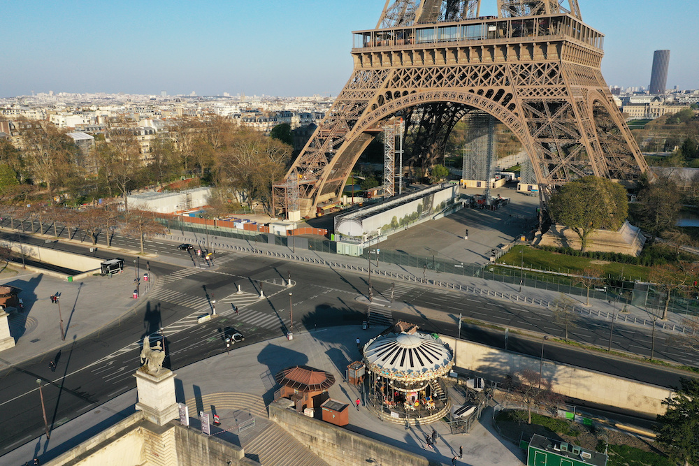 An aerial view shows the deserted Eiffel tower in Paris during a lockdown imposed to slow the spread of the coronavirus disease (Covid-19) in France, April 1, 2020. Picture taken with a drone April 1, 2020. u00e2u20acu201d Reuters picnn