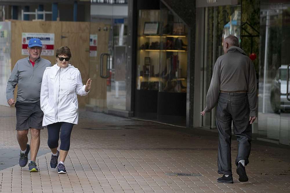 Pedestrians practise social distancing in response to the Covid-19 coronavirus outbreak along a street of Lower Hutt, near Wellington, New Zealand April 20, 2020. u00e2u20acu201d AFP pic
