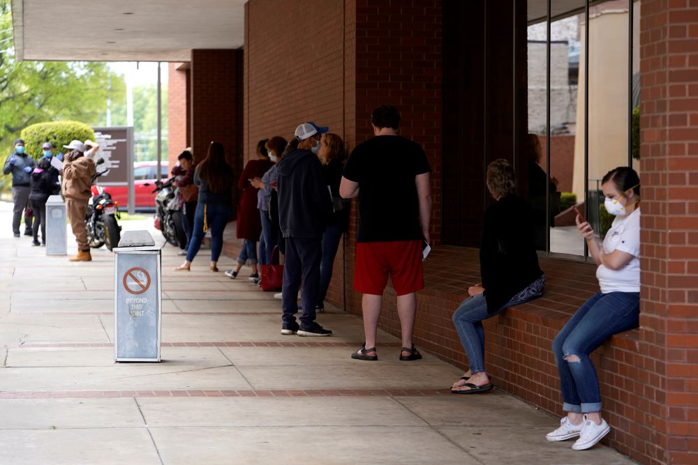 People who lost their jobs wait in line to file for unemployment following an outbreak of the coronavirus disease, at an Arkansas Workforce Centre April 6, 2020. u00e2u20acu201d Reuters pic