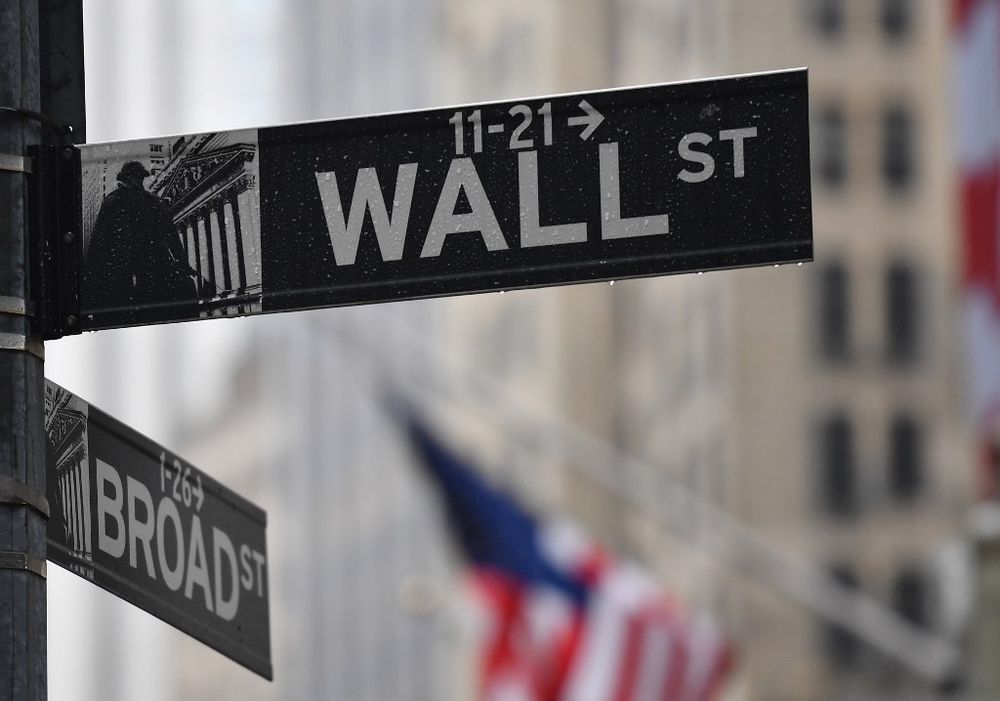 In this file photo the Wall Street street sign is seen on March 23, 2020 in New York City. u00e2u20acu201d AFP pic