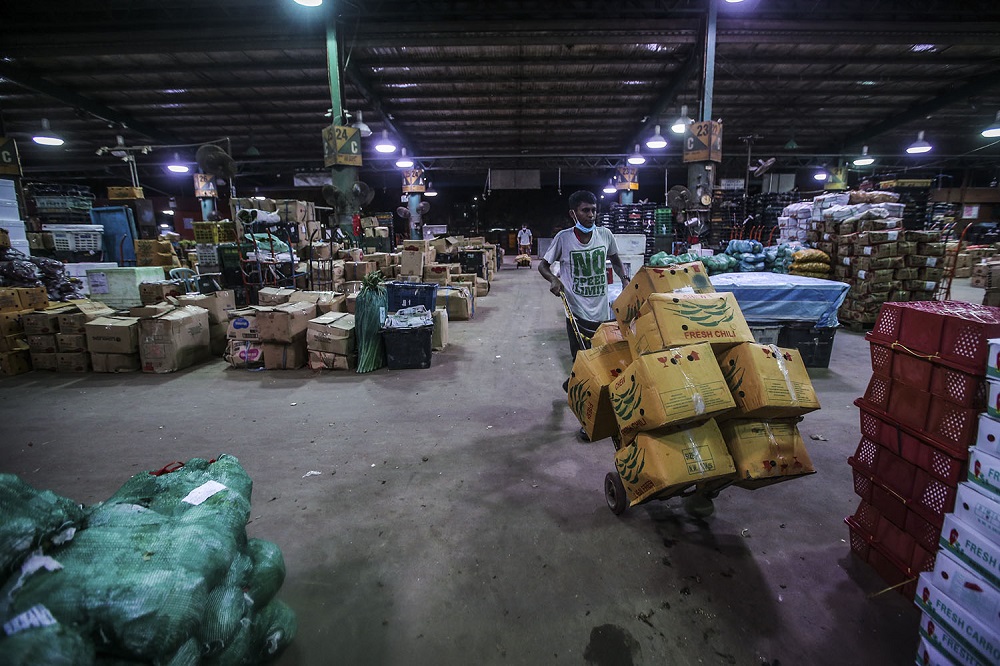 A general view of the Kuala Lumpur wholesale market as traders resumed business after the enhanced movement control order on the area was lifted, May 13, 2020. — Picture by Hari Anggara