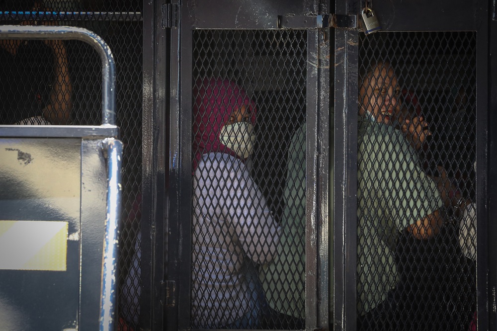 Illegal immigrants are detained by the Immigration Department following raids carried out at Selayang Baru in Kuala Lumpur May 14, 2020. u00e2u20acu201d Picture by Yusof Mat Isa