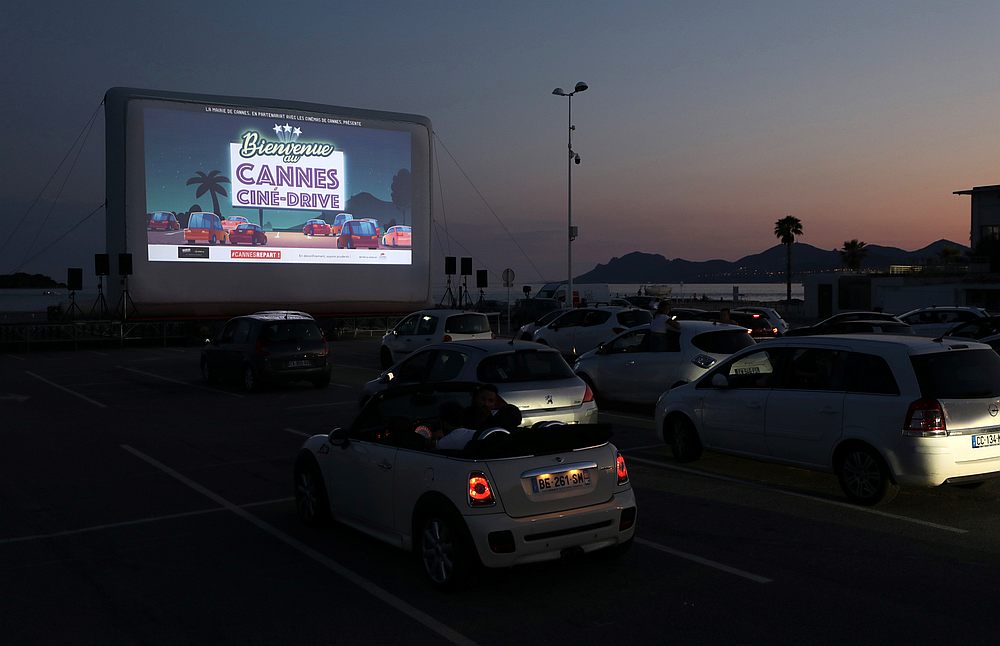 People sit in their cars to watch the movie 'E.T. the Extra-Terrestrial' by Steven Spielberg at a drive-in cinema at la Pointe Croisette, in Cannes, France May 20, 2020. u00e2u20acu201d Reuters pic