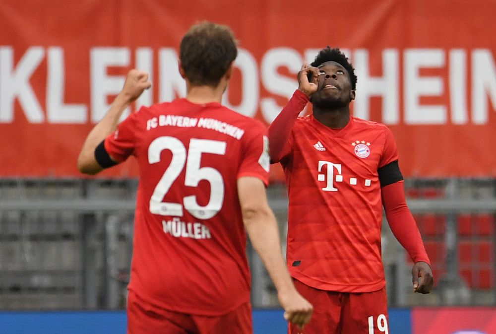 Bayern Munich's Alphonso Davies celebrates scoring their fourth goal against Eintracht Frankfurt  as play resumes behind closed doors following the outbreak of the coronavirus diseaseMay 23, 2020. u00e2u20acu201d Reuters pic