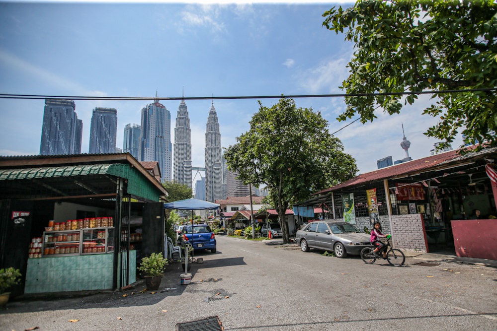 High-rise buildings like the Petronas Twin Towers can be seen from all parts of Kampung Baru. u00e2u20acu2022 Picture by Hari Anggara