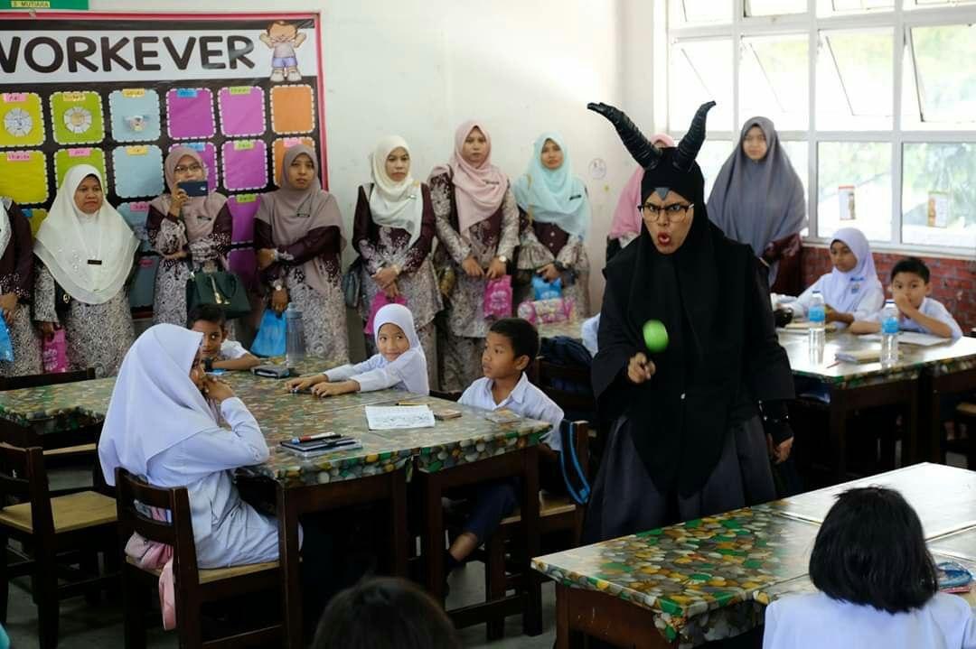 Norashikin in costume as 'Maleficent' during one of her 'Grammar-Telling' lessons. — Picture courtesy of Norashikin Zainull Abdin