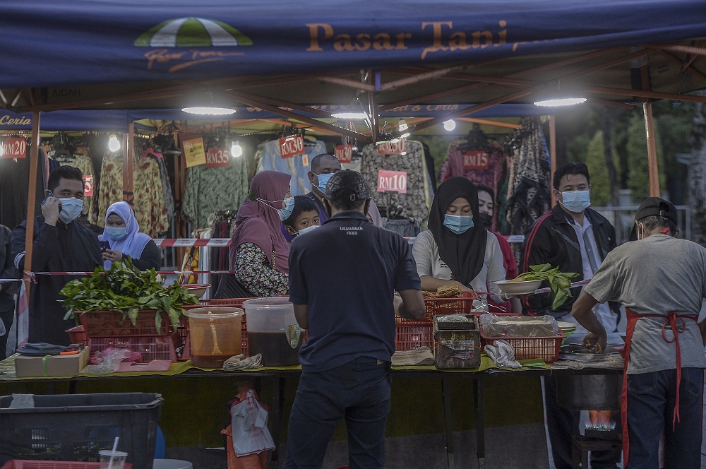 People buying fresh produce at the Putrajaya night market June 26, 2020. u00e2u20acu201d Picture by Shafwan Zaidon