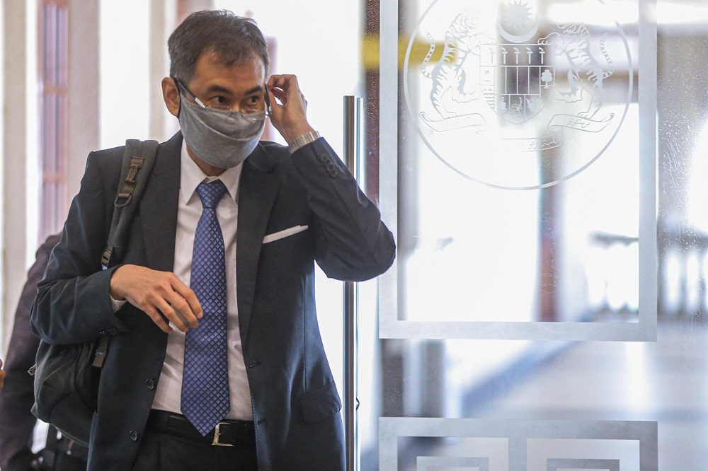 Former 1MDB chief executive officer Datuk Shahrol Azral Ibrahim Halmi leaves the Kuala Lumpur Court Complex June 30, 2020. — Picture by Hari Anggara