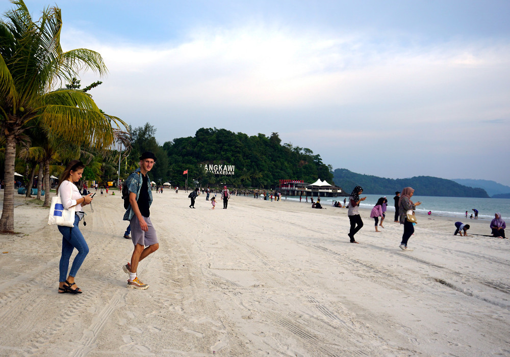 Tourists are seen on Chenang Beach in Langkawi June 12, 2020. — Bernama pic