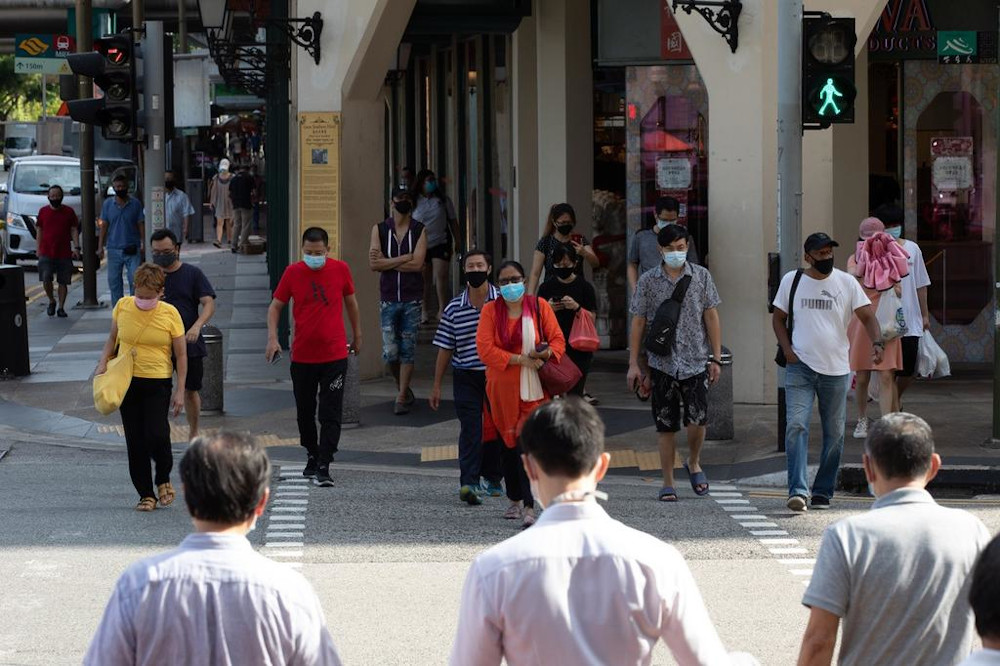 Based on the MOHu00e2u20acu2122s investigations so far, there are nine cases in the community, of whom four are Singaporeans or permanent residents and five are work pass holders. u00e2u20acu201d TODAY pic 