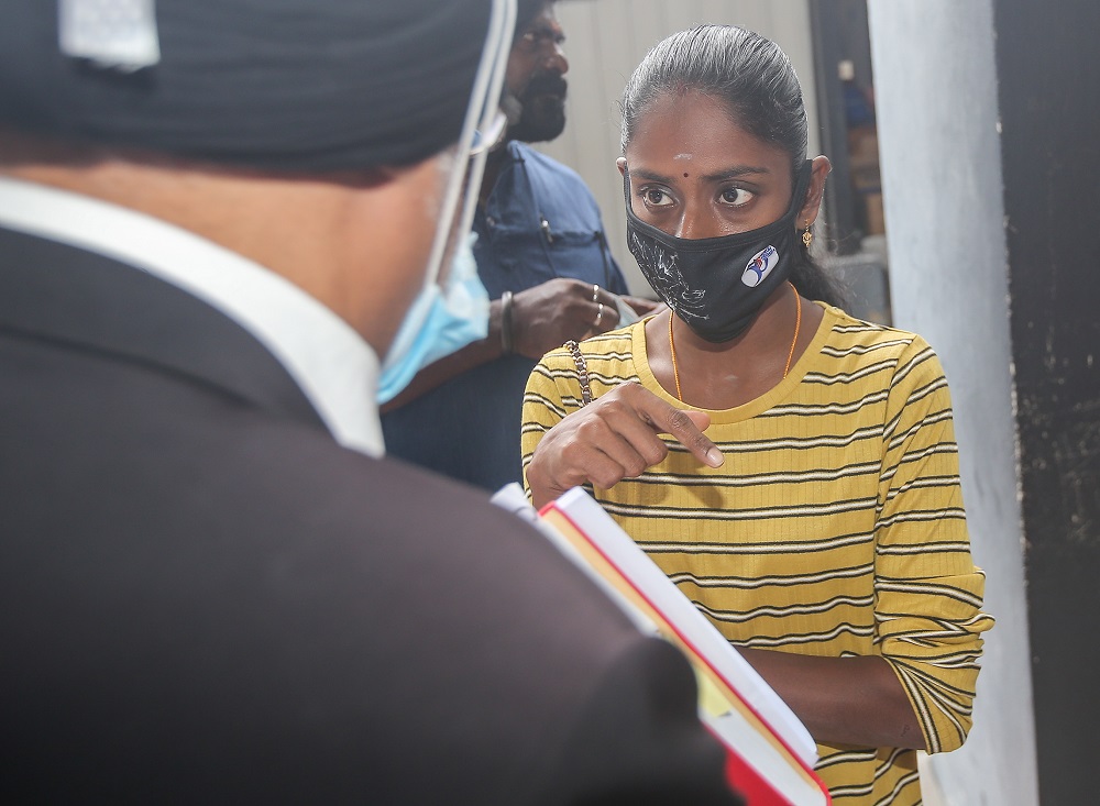 Malaysian YouTube sensation S. Pavithra is seen at the Magistrate Court in Ipoh as her husband M. Sugu claims trial to possession of a dangerous weapon in a public place, July 24, 2020. u00e2u20acu201d Picture by Farhan Najib