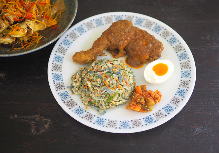 Simply Nyonya offers a 'nasi ulam' set with beautifully perfumed herb rice, chicken 'rendang', 'acar' and salted egg — Pictures by Lee Khang Yi