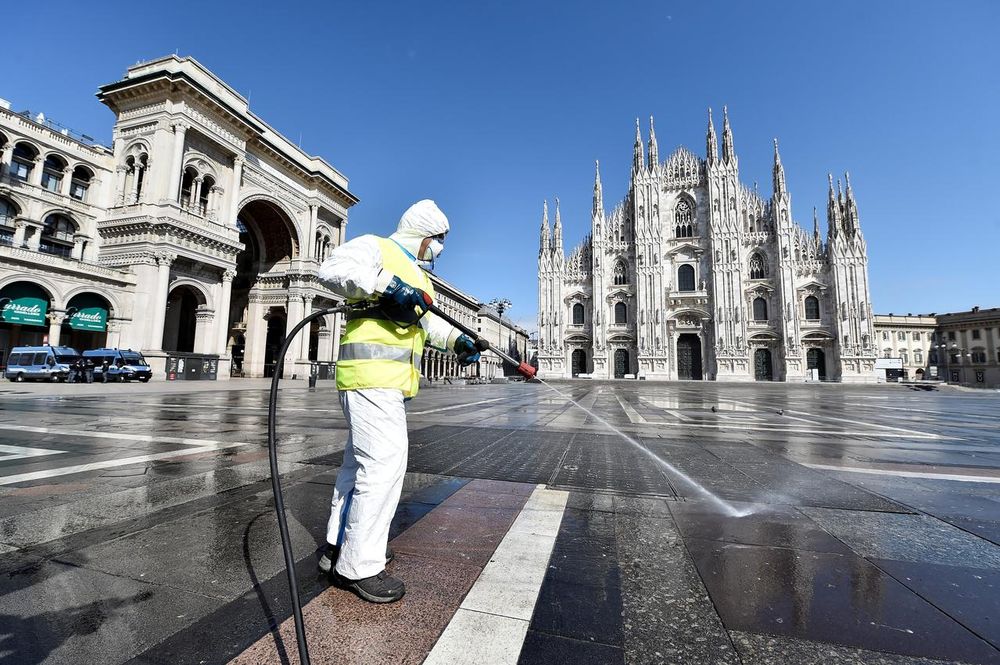 A worker wearing protective garments sanitises the Duomo square, during the coronavirus disease (Covid-19) outbreak in central Milan, Italy March 31, 2020. u00e2u20acu201d Reuters pic