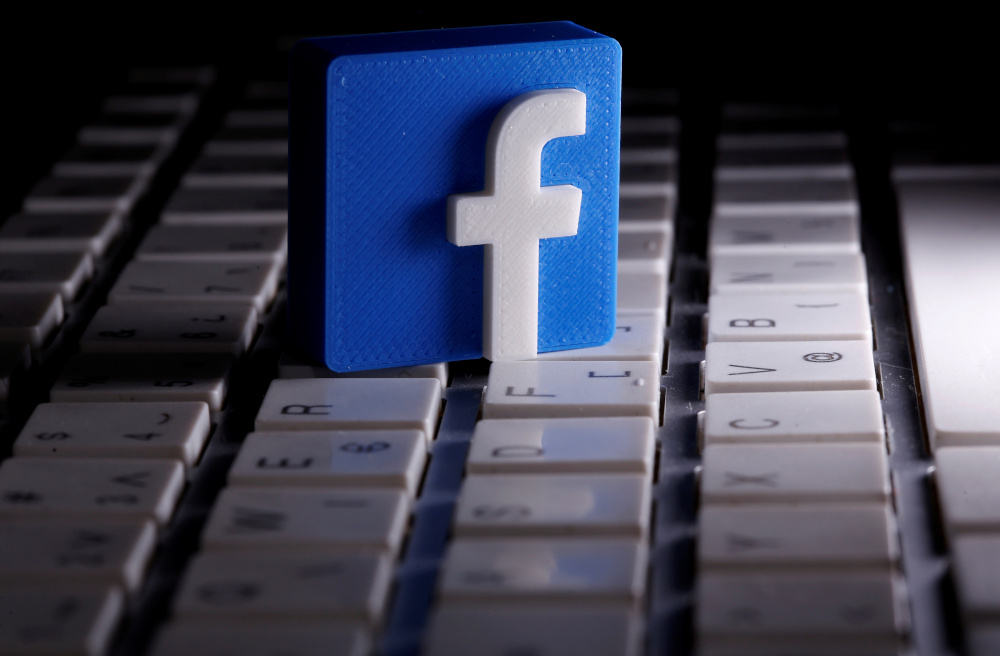 A 3D-printed Facebook logo is seen placed on a keyboard in this illustration taken March 25, 2020. u00e2u20acu201d Reuters pic