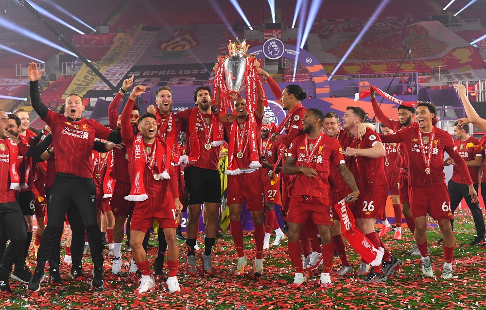 Liverpool players and staff celebrate with the Premier League trophy at Anfield July 23, 2020. u00e2u20acu2022 Reuters pic
