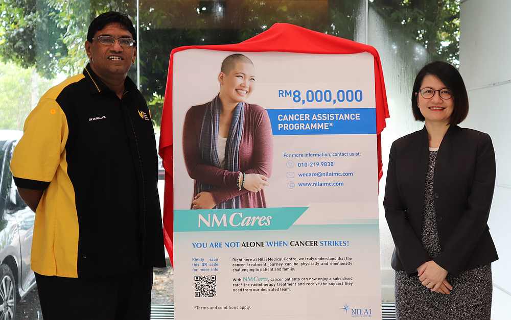 Nilai Medical CEO Jasmine Lau (right) with National Cancer Society Malaysia general manager and medical director Dr Murallitharan Munisamy. u00e2u20acu201d Picture courtesy of Nilai Medical