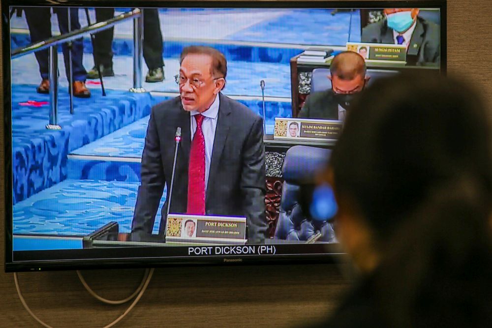 Opposition leader Datuk Seri Anwar Ibrahim delivers his speech during the second meeting of the third session of the 14th Parliament during a live broadcast in Kuala Lumpur July 13, 2020. u00e2u20acu201d Picture by Hari Anggara