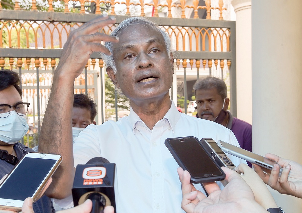 PSM chairman Dr Jeyakumar Devaraj speaks to reporters on the land issues faced by small-scale farmers in Perak in front of the State Secretariat Building in Ipoh July 15, 2020. u00e2u20acu2022 Picture by Farhan Najib