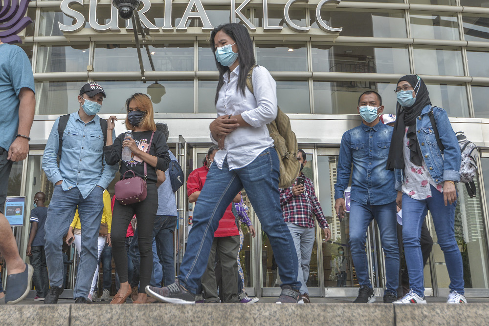 Pedestrians wearing face masks at a public area in Kuala Lumpur August 1, 2020. u00e2u20acu201d Picture by Shafwan Zaidon 