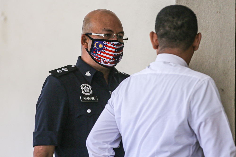 Nilai police chief Supt Mohd Marzukee Besar arrives at the Seremban Court Complex August 26, 2020. u00e2u20acu201d Picture by Hari Anggara.