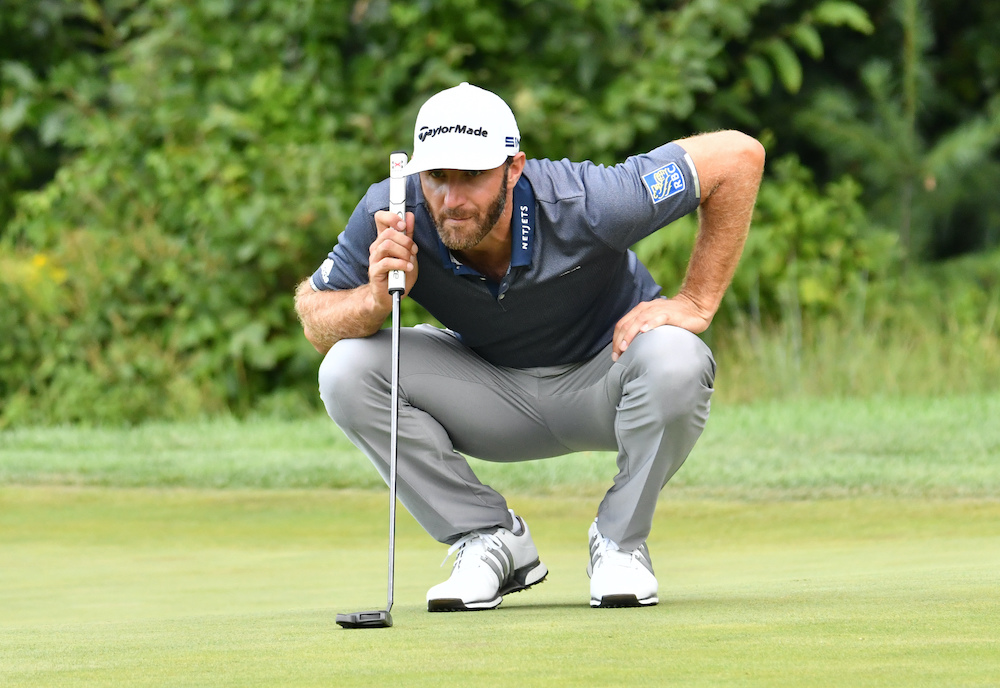 Dustin Johnson lines up a putt on the fifth green during the third round of The Northern Trust golf tournament at TPC of Boston August 22, 2020. u00e2u20acu201d Mark Konezny-USA TODAY Sports pic via Reuters