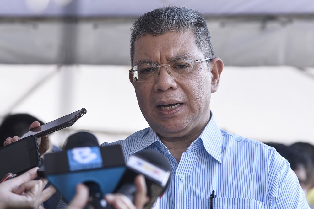 Minister of Communications and Multimedia Datuk Saifuddin Abdullah addresses reporters at the launch of Oryctesu00e2u20acu2122 high precision agriculture spraying drone in Cyberjaya August 25, 2020. u00e2u20acu201d Picture by Miera Zulyana