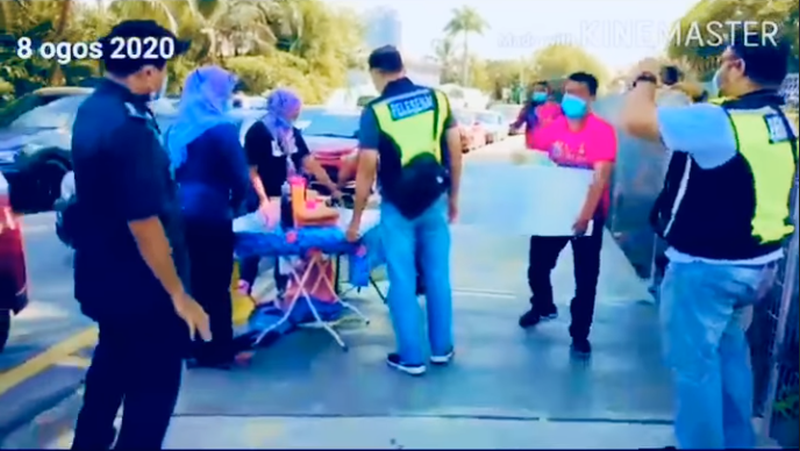 The viral video showed a team of uniformed DBKL officers taking away a vendoru00e2u20acu2122s table and chairs on the pathway next to Titiwangsa Lake, as two woman operators cry and plead with the officers. u00e2u20acu201d Facebook screenshot