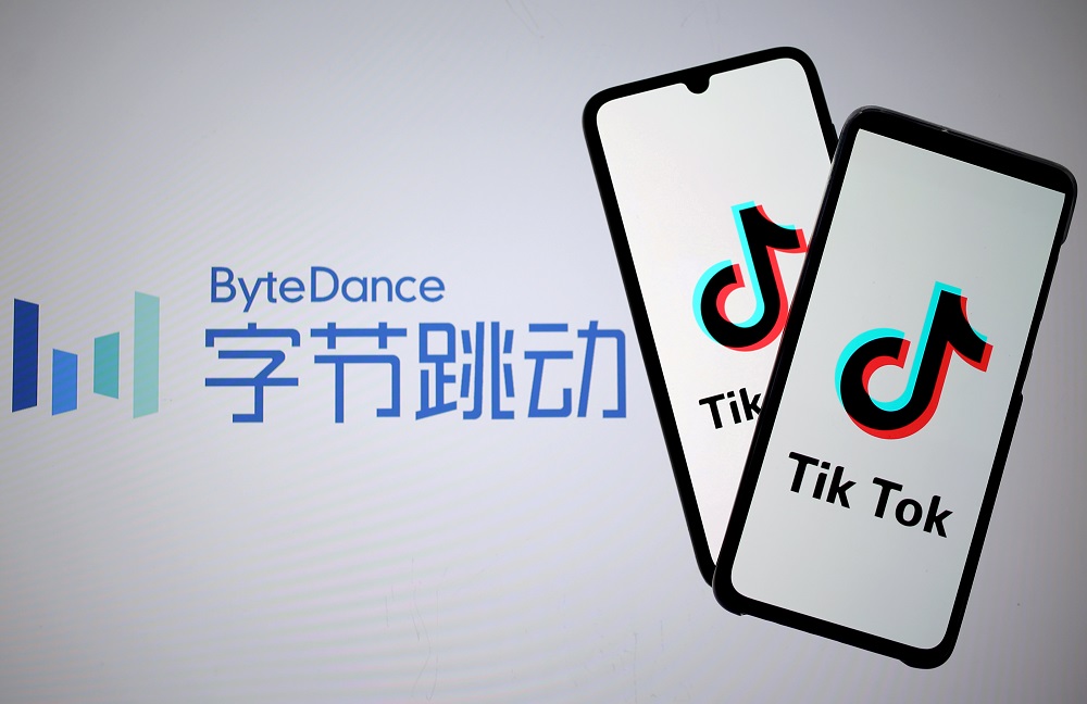 Tik Tok logos are seen on smartphones in front of a displayed ByteDance logo in this illustration taken November 27, 2019. — Reuters pic