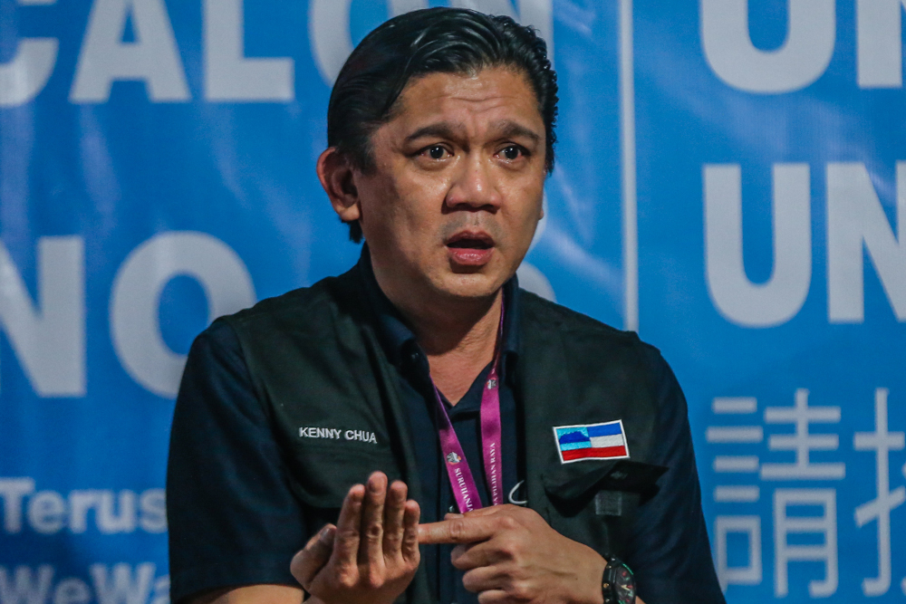 Independent candidate for the Inanam constituency Kenny Chua speaks during the Sabah State Election campaign in Kota Kinabalu, Sabah September 13, 2020. u00e2u20acu201d Picture by Firdaus Latif