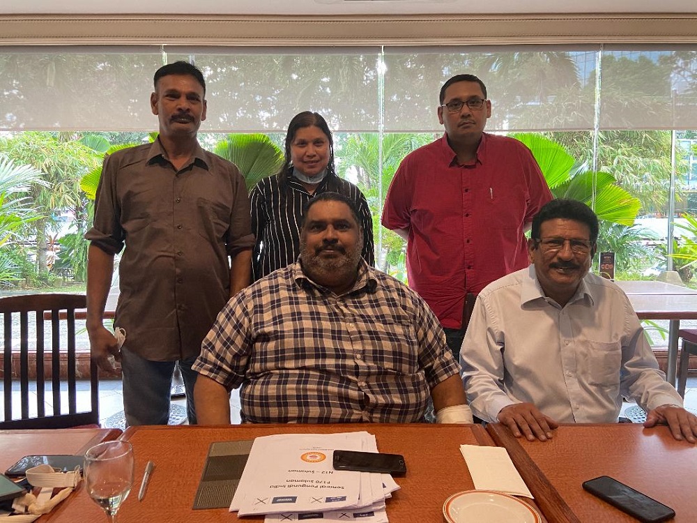 Parti Makkal Sakti Sabah chief Datuk A. Nagaraju (seated left) with the leaders of the party during a press conference in Kota Kinabalu September 24, 2020. u00e2u20acu201d Borneo Post Online pic