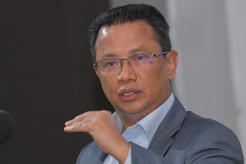 Malaysian Olympic Council president Tan Sri Mohamad Norza Zakaria speaks during a press conference in Kuala Lumpur September 26, 2020. u00e2u20acu201d Bernama pic