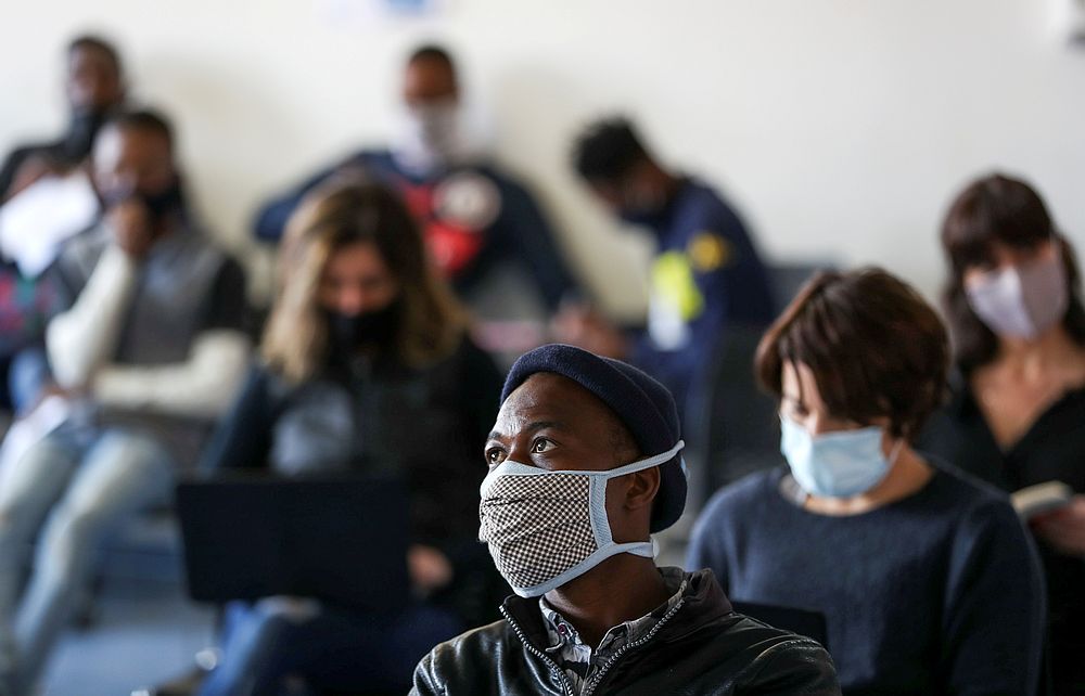 Vaccine trial volunteers wait for their names to be called before testing for Covid-19 in Johannesburg, South Africa, August 27, 2020. u00e2u20acu201d Reuters pic