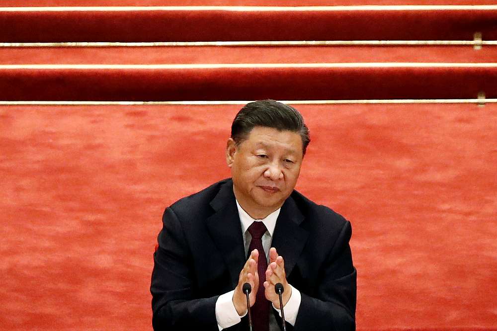 Chinese President Xi Jinping applauds during a meeting to commend role models in China's fight against the Covid-19 outbreak, at the Great Hall of the People in Beijing, China September 8, 2020. u00e2u20acu201d Reuters pic