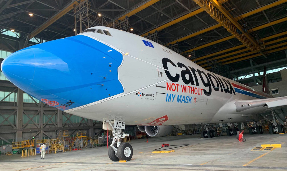 The 747-8 freighter had a surgical mask painted onto its nose-door to emphasise the importance of protective gear in the fight against Covid-19. — Picture from Facebook/CargoluxAirlines