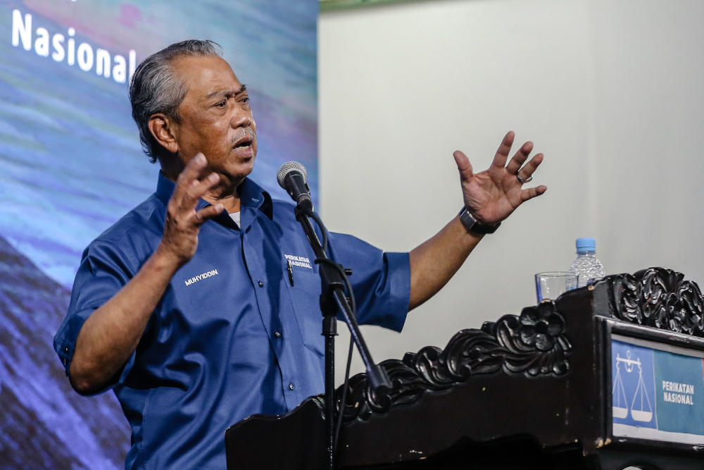 Perikatan Nasional chairman Tan Sri Muhyiddin Yassin speaks while campaigning in Putatan Sabah September 24, 2020. u00e2u20acu201d Picture by Firdaus Latif