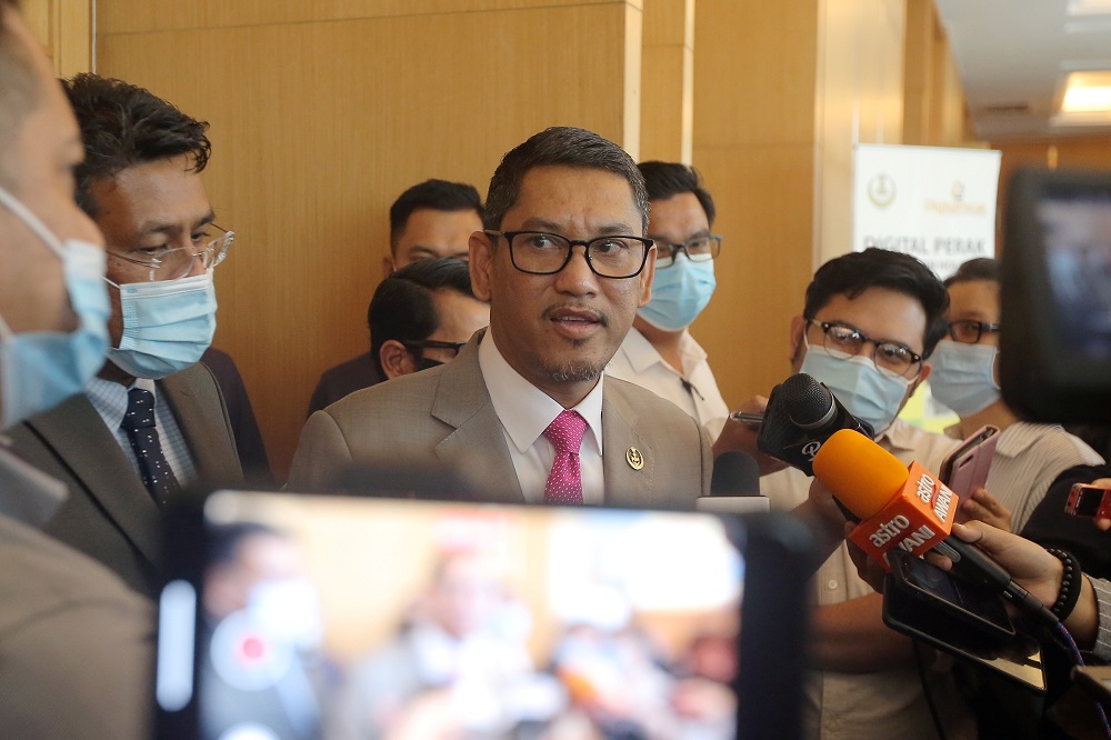 Datuk Seri Ahmad Faizal Azumu speaking to press at the Weil Hotel in Ipoh October 9, 2020. — Picture by Farhan Najibk