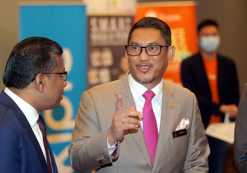 Datuk Seri Ahmad Faizal Azumu speaking to press at the Weil Hotel in Ipoh October 9, 2020. u00e2u20acu201d Picture by Farhan Najibk