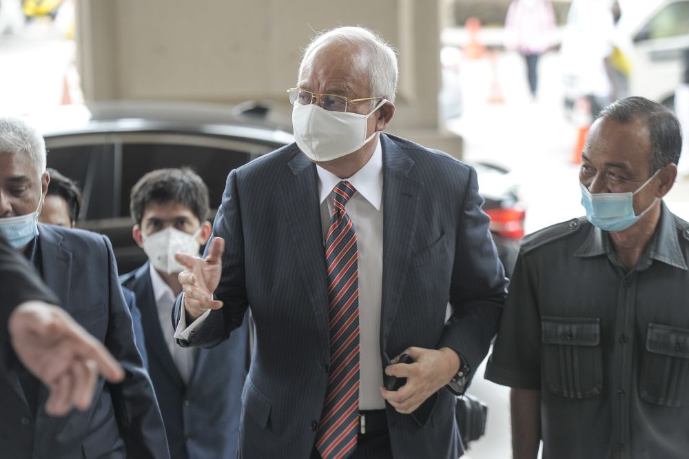 Datuk Seri Najib Razak arrives at the Kuala Lumpur High Court October 13, 2020. — Picture by Shafwan Zaidon