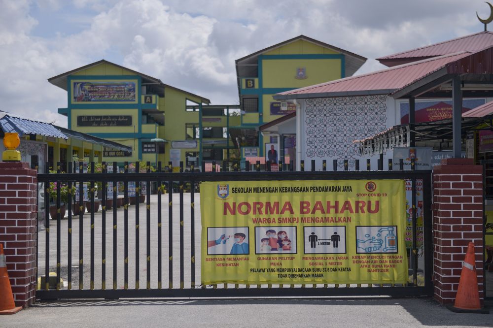 The gates of a secondary school in Pandamaran are closed ahead of the conditional movement control order in Klang October 8, 2020. u00e2u20acu201d Picture by Miera Zulyanann