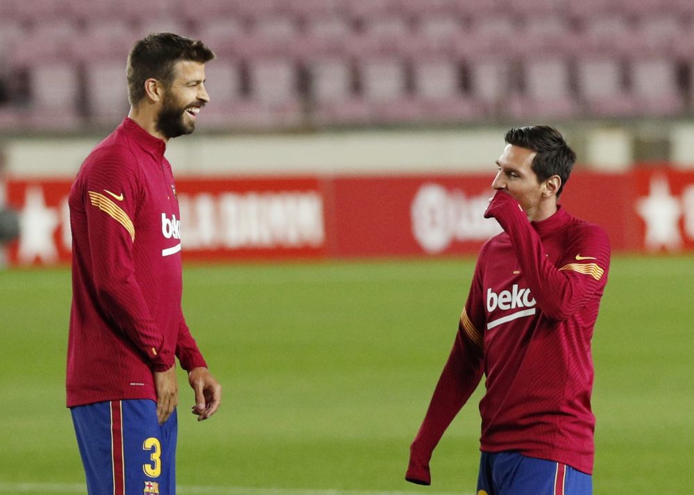Barcelona's Lionel Messi and Gerard Pique during the warm up before the match against Villarreal September 27, 2020. u00e2u20acu201d Reuters pic