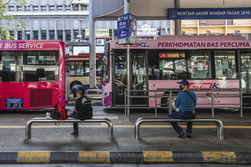 Passengers wait for their ride at the Pasar Seni bus station in Kuala Lumpur October 29, 2020. u00e2u20acu201d Picture by Yusof Mat Isa