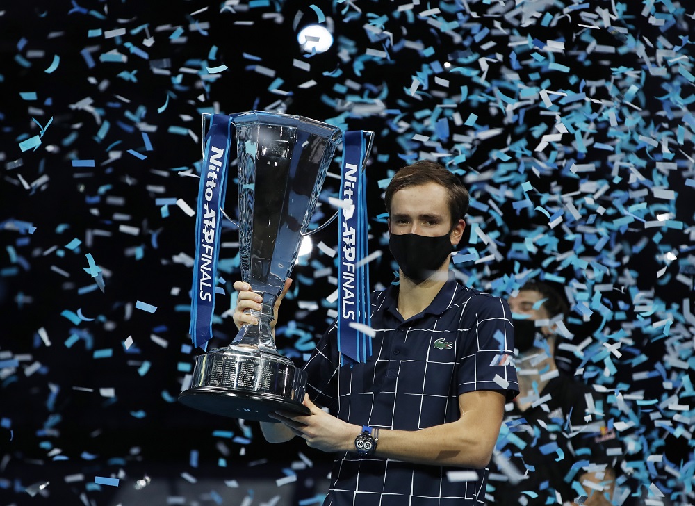 Russia's Daniil Medvedev lifts the trophy as he celebrates winning the final match against Austria's Dominic Thiem at the O2 stadium in London November 22, 2020. u00e2u20acu201d Action Images via Reuters 