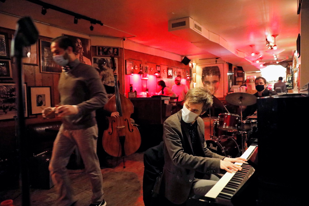 The Ryan Slatko Trio performs at Rue-B, a live jazz bar in the Alphabet City neighbourhood of Manhattan, New York City as new restrictions were announced on bars and restaurants for 10 PM closure, November 13, 2020. ― Reuters pic