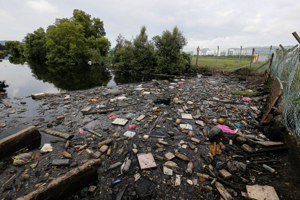 The garbage-strewn Sungai Nipah is pictured in Batu Maung November 5, 2020. u00e2u20acu201d Picture by Sayuti Zainudin
