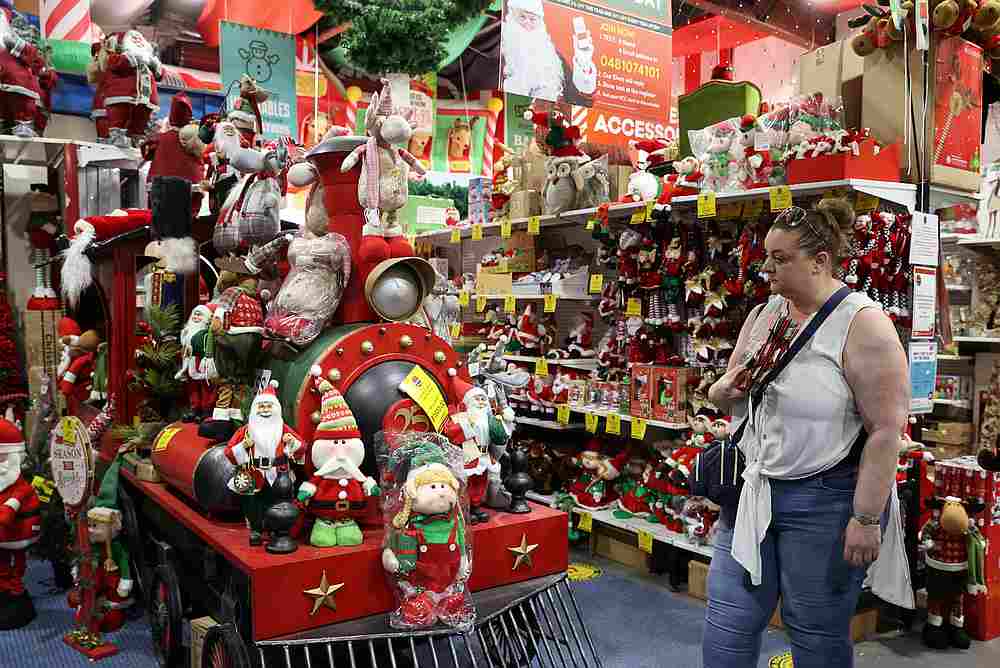 A customer shops inside a Christmas store as Covid-19 regulations are further eased for the state of New South Wales in Sydney, Australia November 26, 2020. — Reuters pic