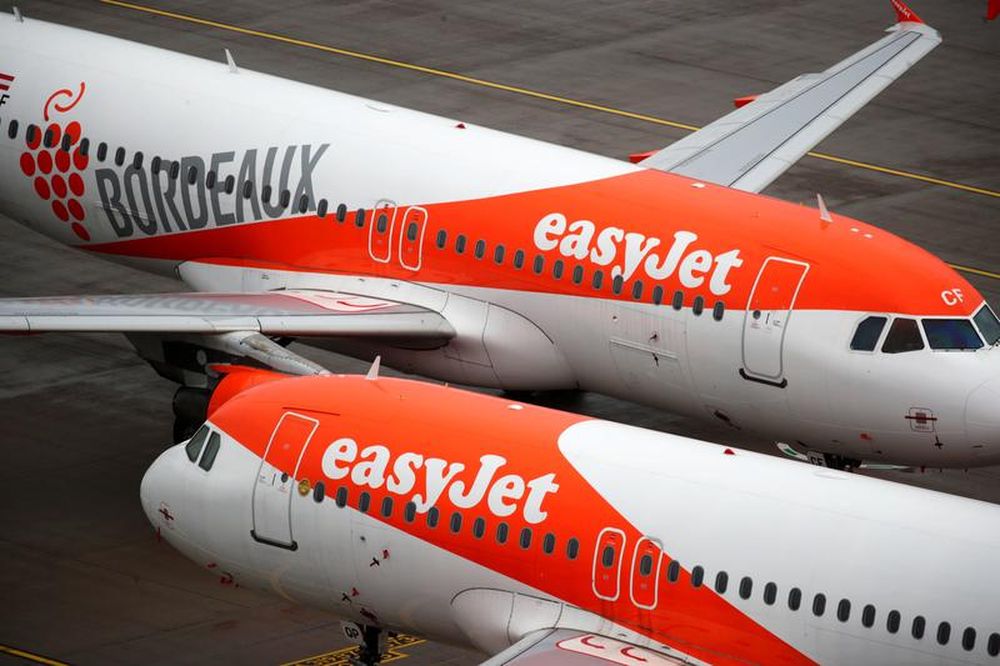 EasyJet aircrafts are seen on the tarmac at Terminal 1, marking the official opening of the new Berlin-Brandenburg Airport (BER) u00e2u20acu02dcWilly Brandtu00e2u20acu2122, in Schoenefeld near Berlin, Germany October 31, 2020. u00e2u20acu201d Reuters pic