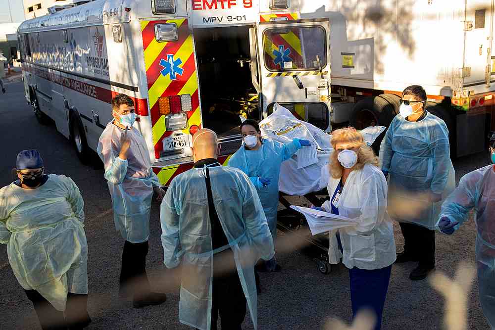 Bodies are moved to refrigerated trailers, deployed during a surge of Covid-19 deaths, outside the County of El Paso Medical Examiners Office in El Paso, Texas November 16, 2020. — Reuters pic Bodies are moved to refrigerated trailers, deployed during a surge of Covid-19 deaths, outside the County of El Paso Medical Examiners Office in El Paso, Texas November 16, 2020. — Reuters pic