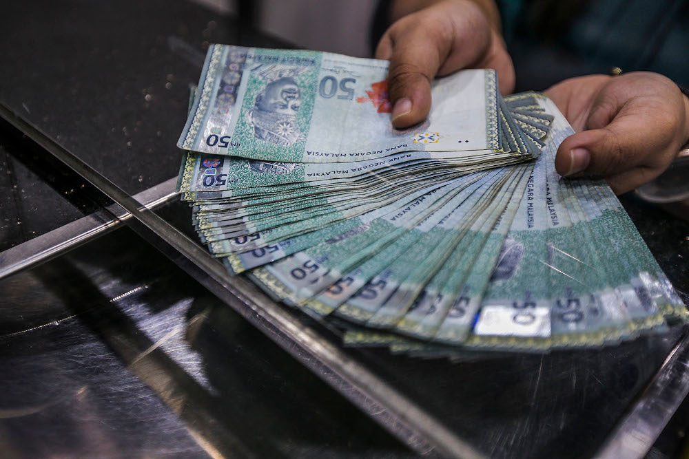 At 9am, the local currency stood at 4.2175/2220 from 4.2185/2215 at Monday’s close. — Picture by Hari Anggara